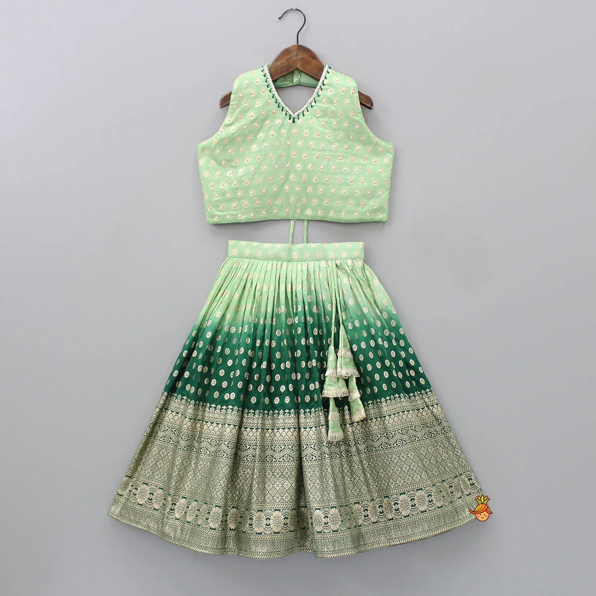 Pre Order: Splendid Embroidered Halter Neck Green Top With Lehenga And Fringed Lace Dupatta